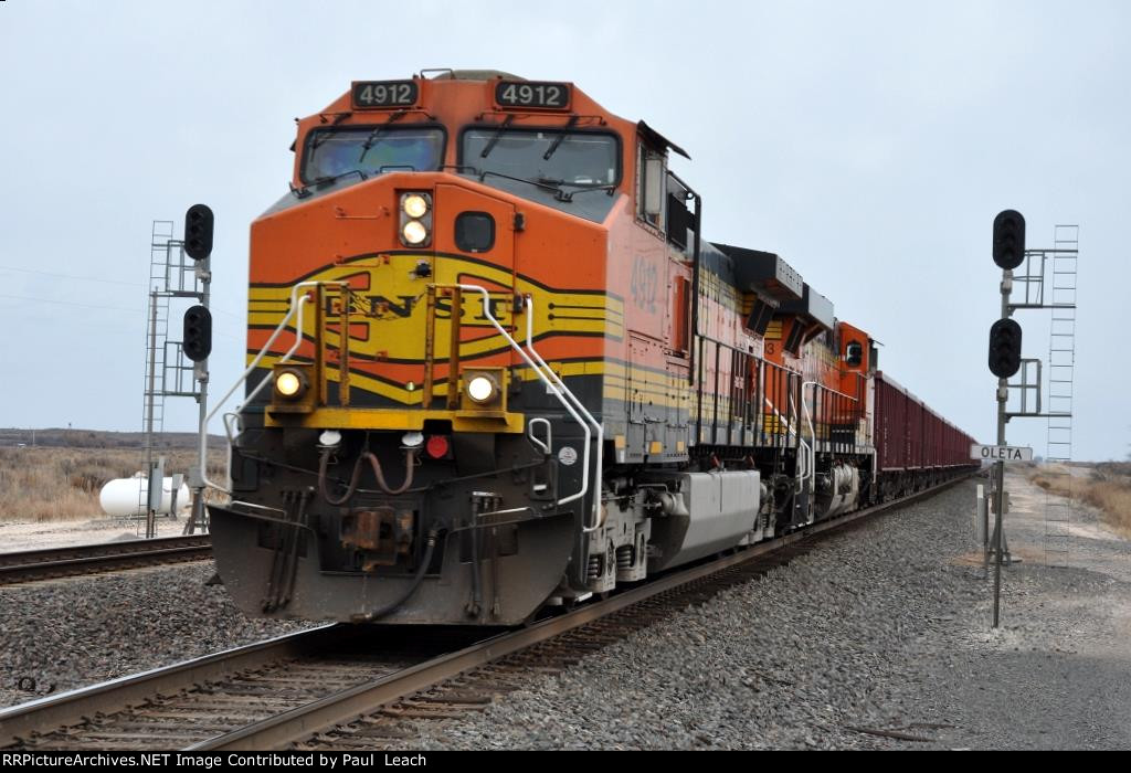 Ballast train hurries west